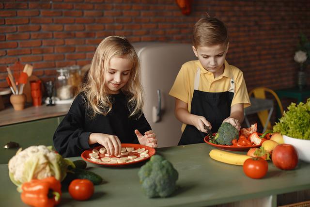 Two children cooking 